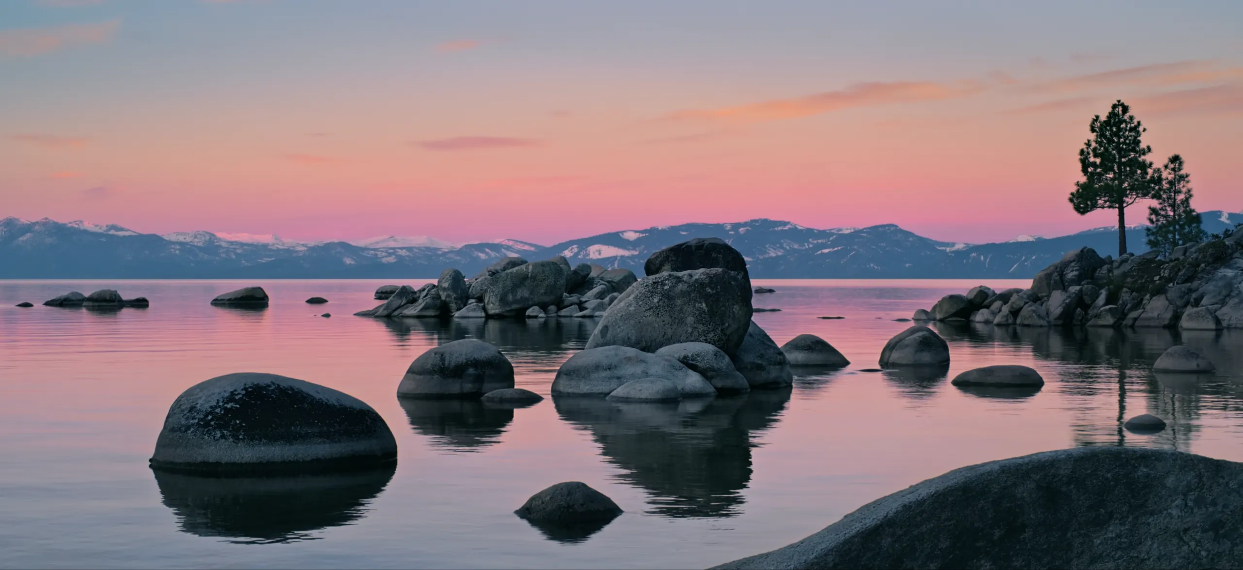 Lake Tahoe from the shoreline, mountains across the water